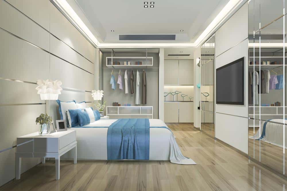 Modern bedroom with glossy furniture and floor