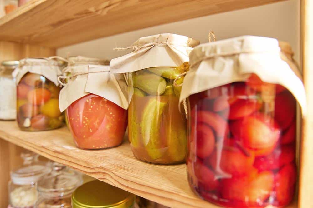 Pantry shelve with preserved food jars
