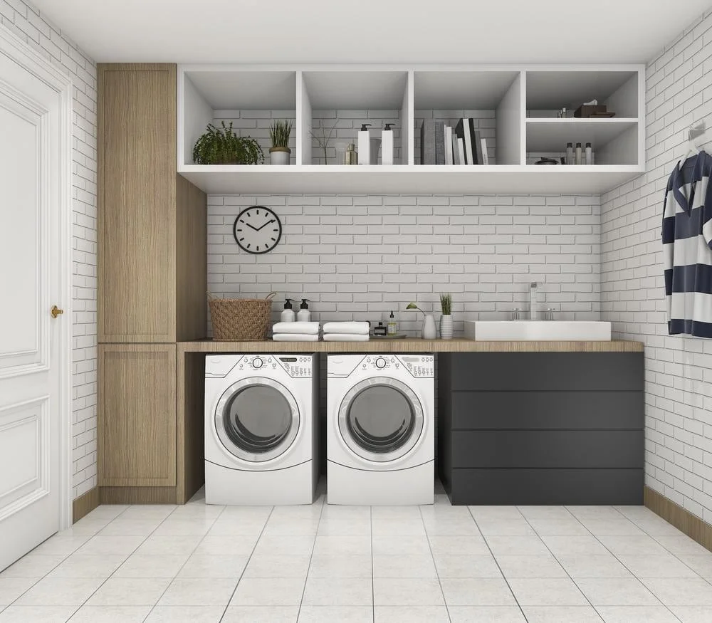 Laundry room with washer dryer cabinets and shelves