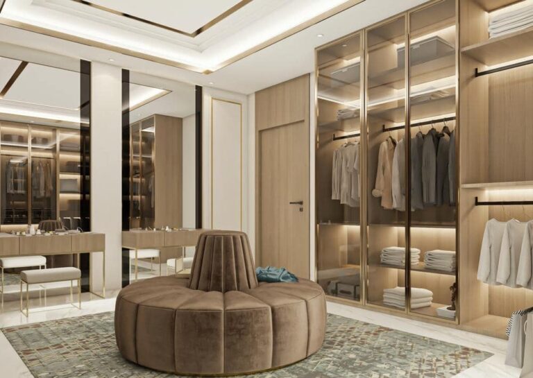 Modern bedroom with lighted open door wooden closet with large ottoman in the middle