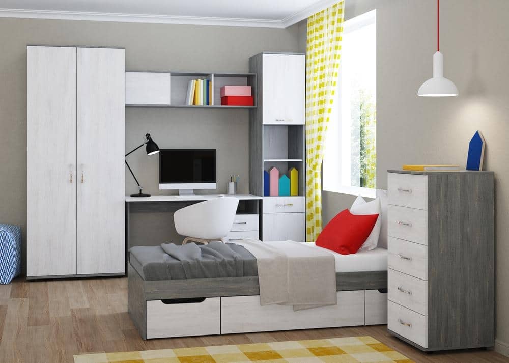 A simple bedroom with drawers under the bed and white closet next to the desk