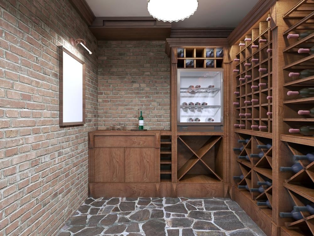 Brick wall wine cellar filled with bottles on racks blank poster on the wall