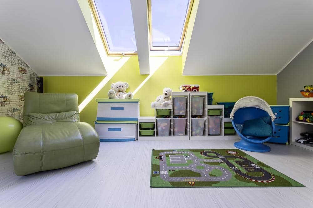 Kids room in attic with large sitting area and organizers