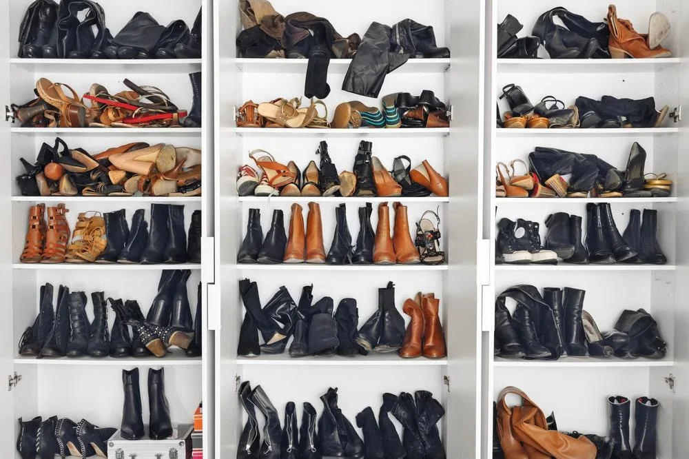 15 Amazing Ways to Organize Your Shoes - Creative Shoe Organization Ideas 2 Large white open shoe closet full of shoes