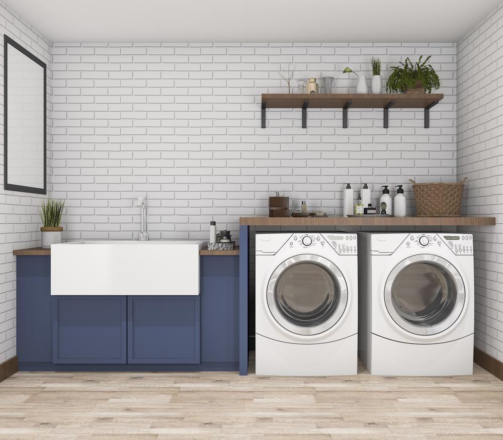Laundry room with open shelf and blue linen closets