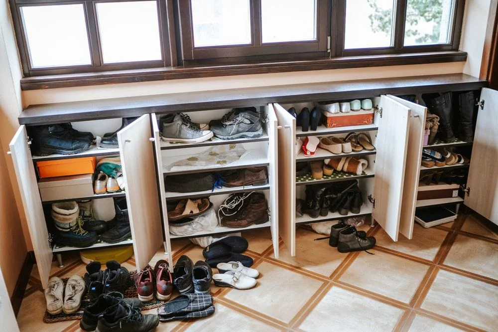 15 Amazing Ways to Organize Your Shoes - Creative Shoe Organization Ideas 13 Crowded shoe organizer with open doors