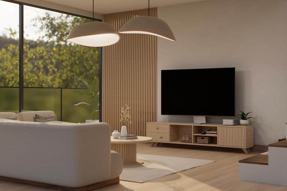 Modern living room with large windows and a tv