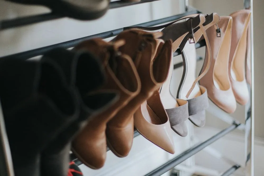 15 Amazing Ways to Organize Your Shoes - Creative Shoe Organization Ideas 10 Shoe rack with hanging shoes on it