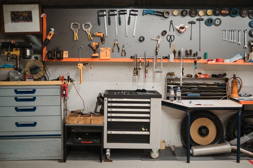 Garage workbench with tools and supplies