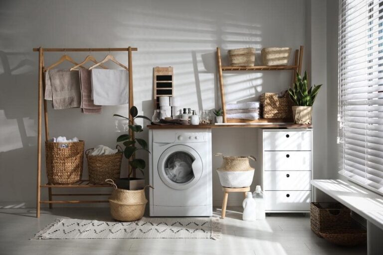 Laundry room with decoration and a window