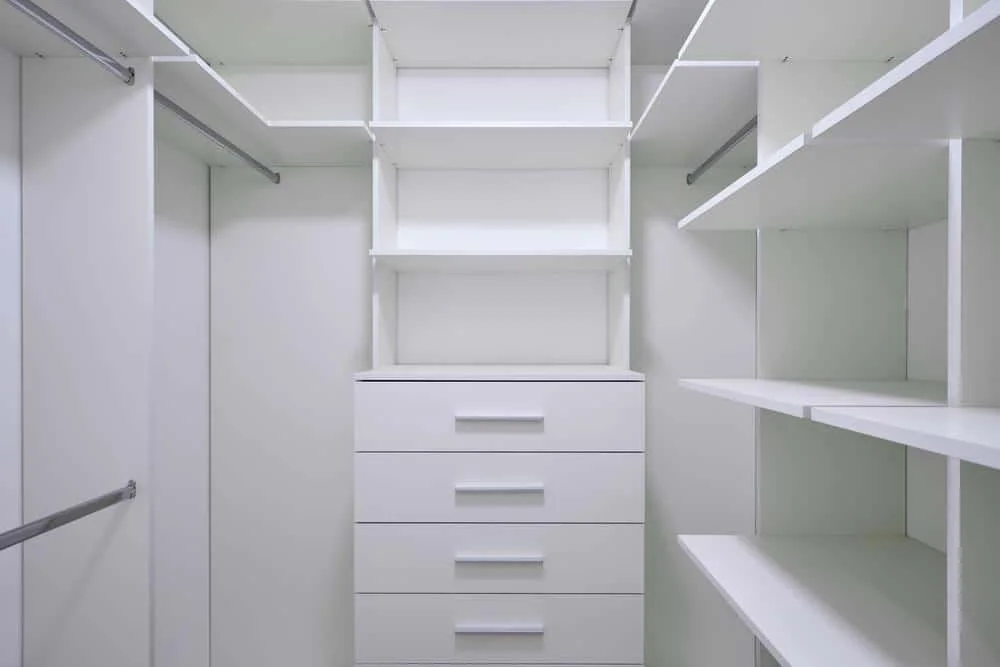 The Power of Simplicity: Embrace Elegance with These 14 White Wardrobe Closet Ideas 18 White wardrobe closet ideas with drawers and hangers