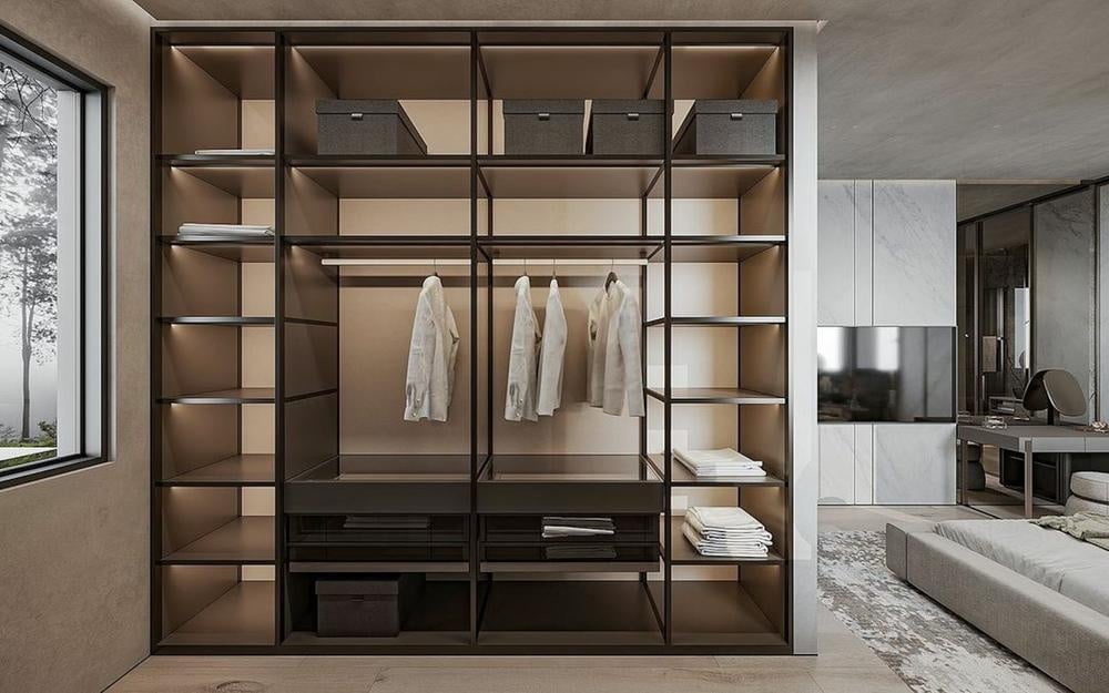 Closet with dark tainted glass door and empty shelves inside