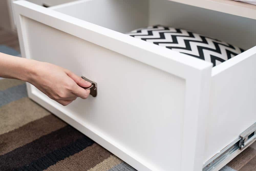 White large drawer pulled by a hand