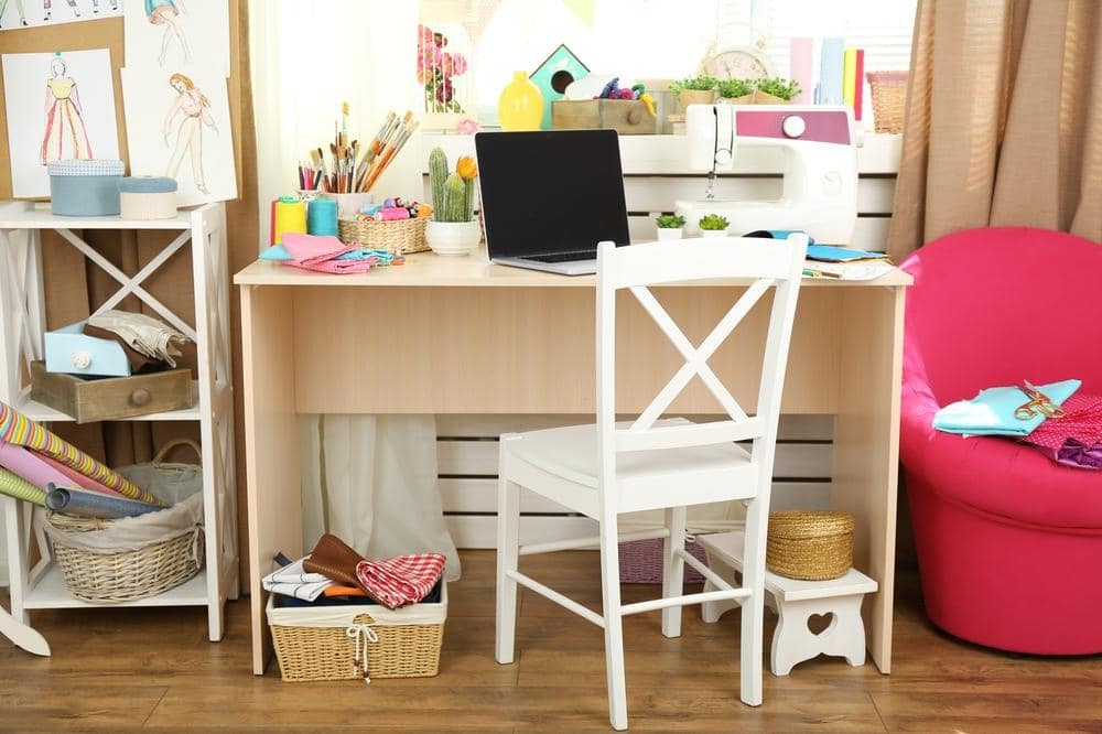 Room with work station and white chair storage baskets
