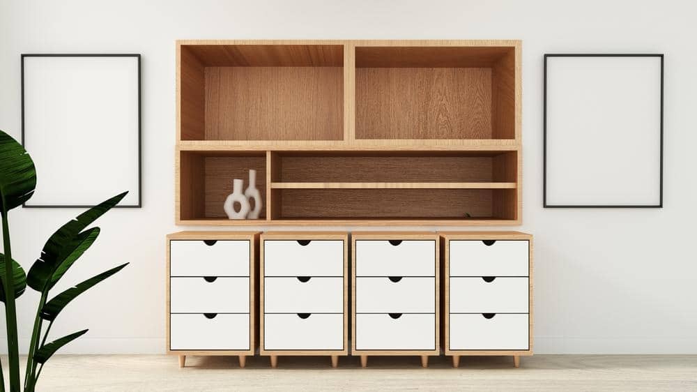 Cabinet unit with white drawers and storage shelves