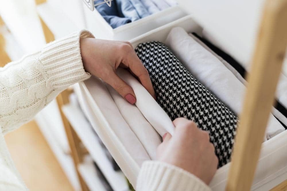Close up classify clothes | mastering the art of organizing a walk-in closet: a comprehensive guide